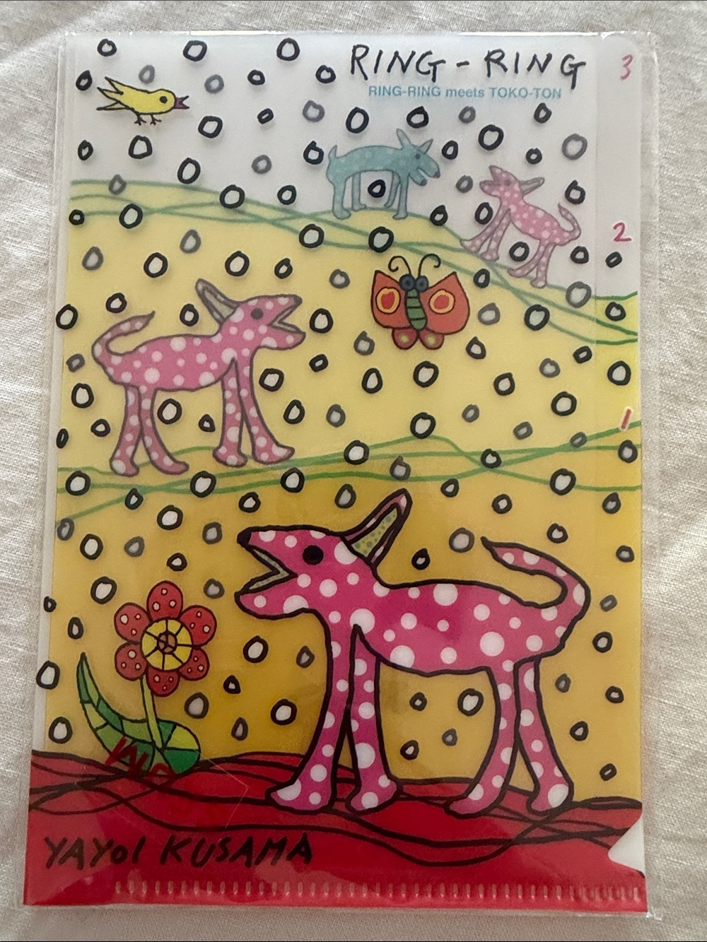 Yayoi Kusama plastic file folder. 3 insert.